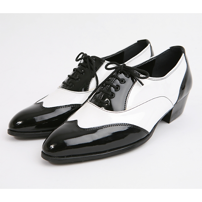 black and white wingtip shoes