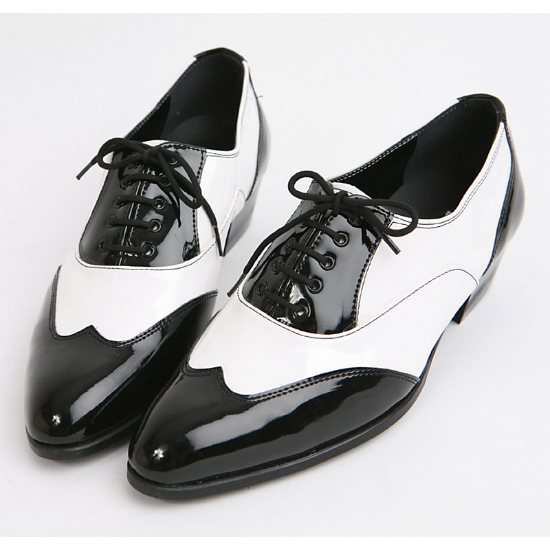 black and white wingtip boots