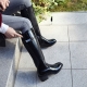 Women's glossy black side zip closure bold heels knee high boots