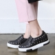 Women's synthetic leather corn spike studded hidden wedge insoles slip-on sneakers black