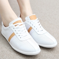 Women's leather punching dotted lace up sneakers 