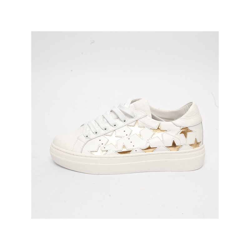 white shoes with gold stars